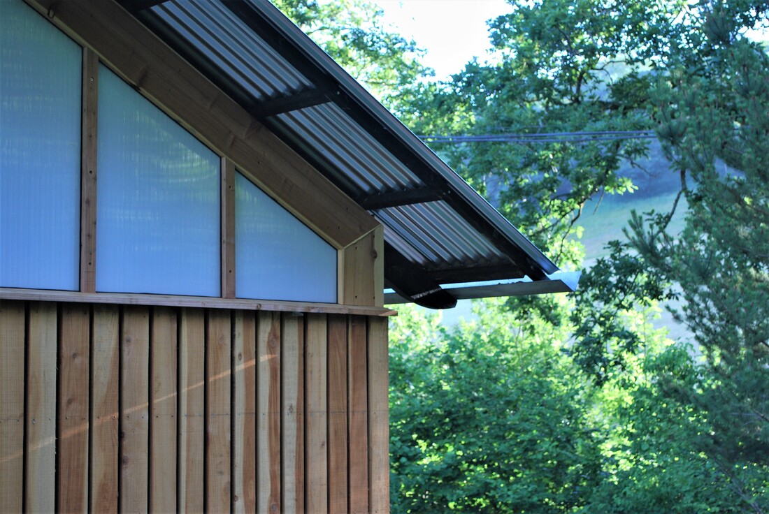 Garden Studio - a generous roof overhang with decorative rafters is a nod to the details found in Japanese timber architecture.  This provides shelter for a cantilevered deck overlooking the garden.​ ​